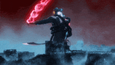 a person holding a sword with a red light coming from it