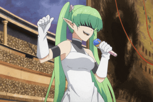 a girl with green hair and white gloves sings into a microphone