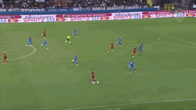 a soccer game is being played in a stadium with advertisements for auto aziendali and tim