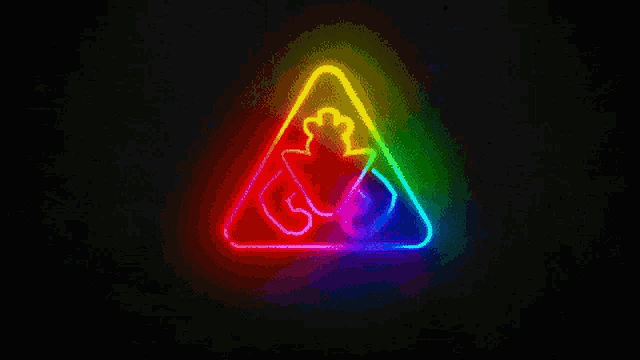 a colorful neon sign with a heart in a triangle