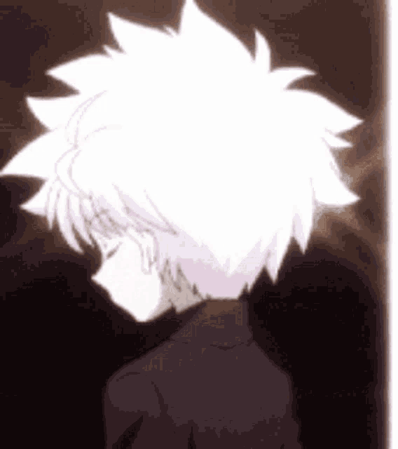 a close up of a person 's head with white hair and a black shirt .