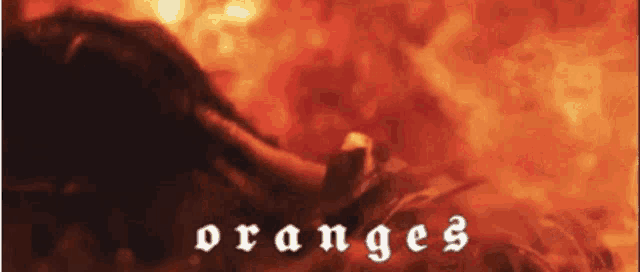 a poster for oranges shows a person laying on the ground