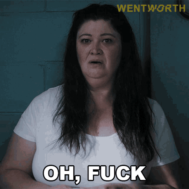 a woman with long hair says oh fuck in front of a wentworth logo