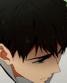 a close up of a person 's face with a white shirt on