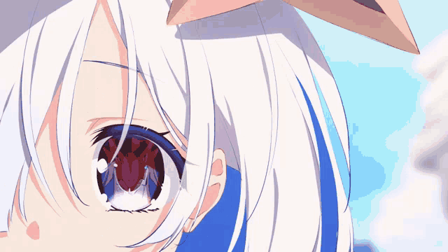 a close up of a girl 's eye with white hair