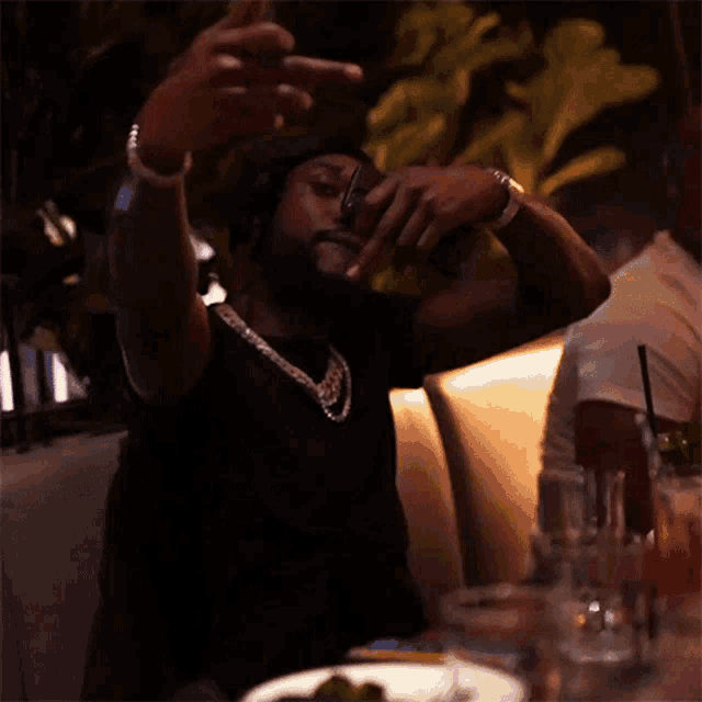 a man is taking a picture of himself with his phone