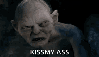 a close up of a monster with its mouth open and the words `` kissmy ass '' written on it .