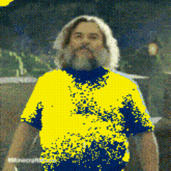 a man with a beard wearing a blue and yellow shirt