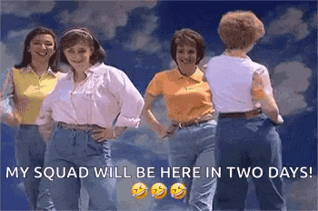 a group of women are standing next to each other .