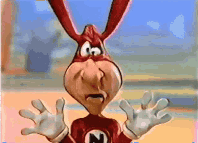 a cartoon character is wearing a red costume with the letter n on it
