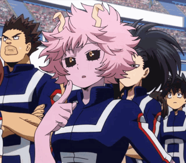 a girl with pink hair is giving a thumbs up in a group of people