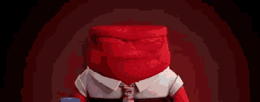 anger from inside out is a stuffed animal wearing a tie and a white shirt .