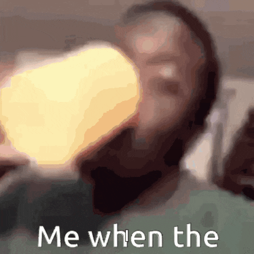 a man is drinking from a bottle with the words me when the written on the bottom