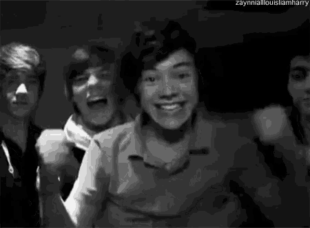 a group of young men are laughing in a black and white photo with the caption zaynnialouisianharry