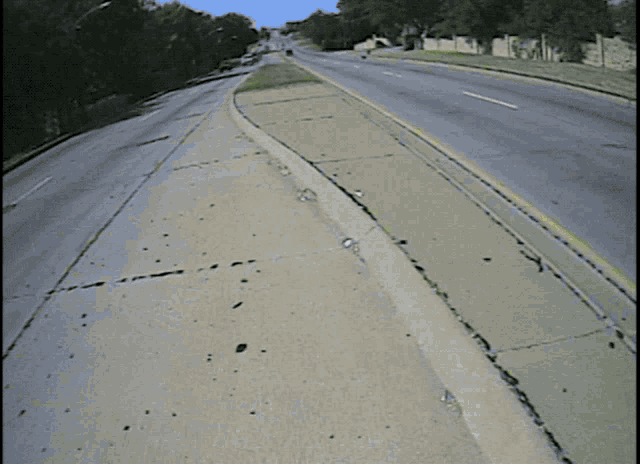 a yellow line on the side of a road shows that it is a one way street
