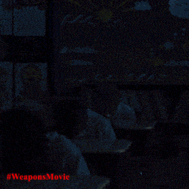a poster for the weapons movie shows a boy in a classroom