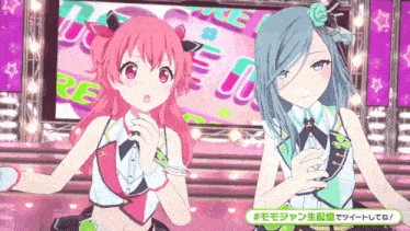 two anime girls are standing next to each other on a stage in front of a screen that says " re " on it