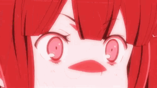 a close up of a red haired anime girl making a funny face with her mouth open .