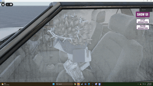 a computer screen shows a stop animation and pause animation
