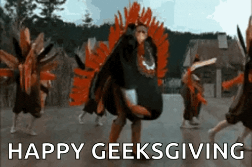 a group of people dressed as turkeys are dancing in front of a sign that says happy geek giving .