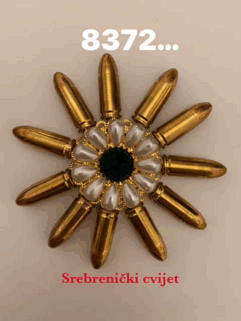 a flower made out of bullets with the number 8372 on the top