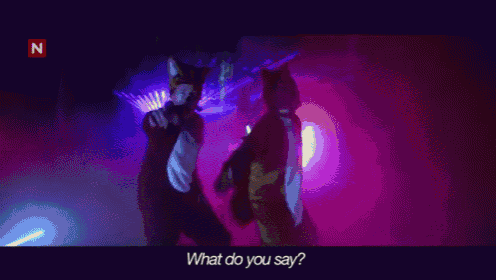a man sits on a couch and says " what do you say " at the bottom