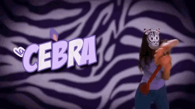 a woman in a zebra mask stands in front of a zebra print background that says zebra
