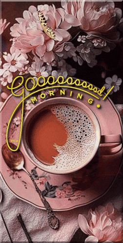 a cup of coffee on a saucer with the words good morning