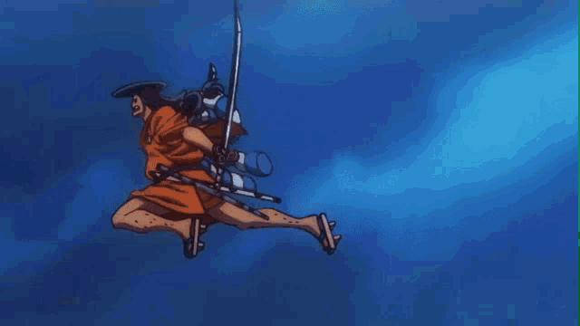 a snake with blue scales is being attacked by a person in a dark room