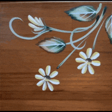 a snowflake is on a wooden table with chinese writing