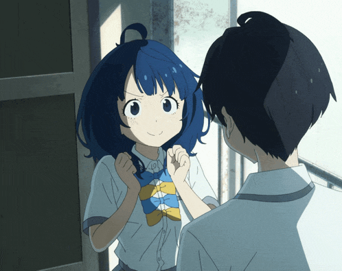 a girl with blue hair is standing next to a boy with black hair
