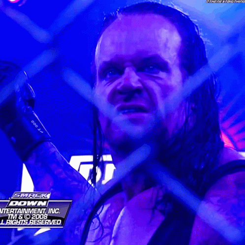 The Undertaker Wrestle Mania GIF - The Undertaker Wrestle Mania Sign GIFs