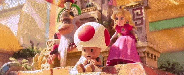a group of cartoon characters including toad and princess peach are standing in front of a building
