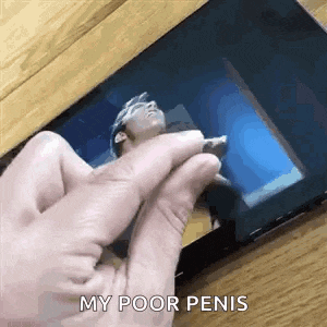 a person is holding a picture of a man in front of a tablet .