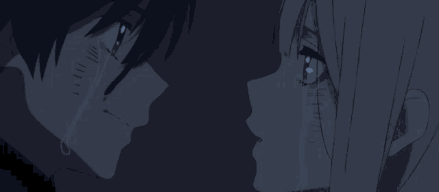 a man and a woman are kissing with blood coming out of their eyes