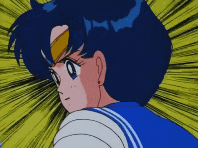 a close up of a cartoon character 's face with blue hair