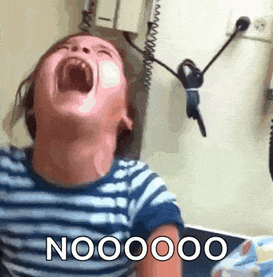a child is screaming with the word nooo on the bottom