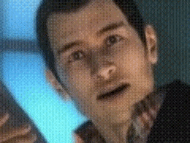 a close up of a man 's face with a shocked look on his face