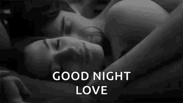 a man and a woman are sleeping in bed with their eyes closed and the words `` good night love '' written above them .