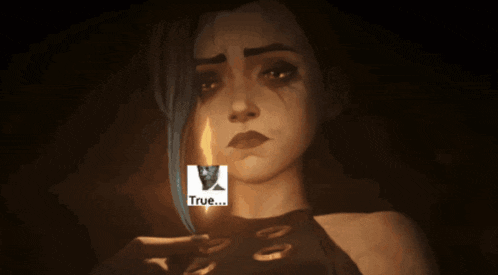 a woman with tears on her face is holding a candle and a sticker that says true