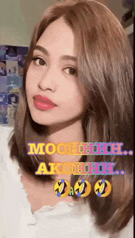 a close up of a woman 's face with a rainbow colored background that says mooohooh akoohoh