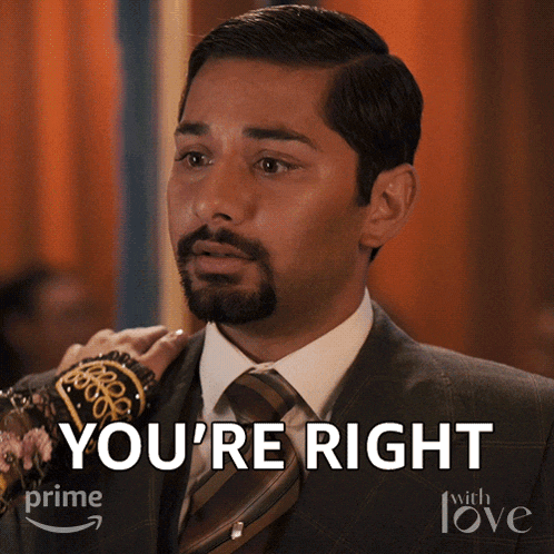 a man in a suit and tie with the words " you 're right " on the bottom right