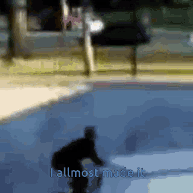 a blurred image of a person skateboarding with the words " i allmost made it " in the corner