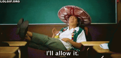 a man wearing a sombrero is sitting in a classroom with his legs crossed and says i 'll allow it .