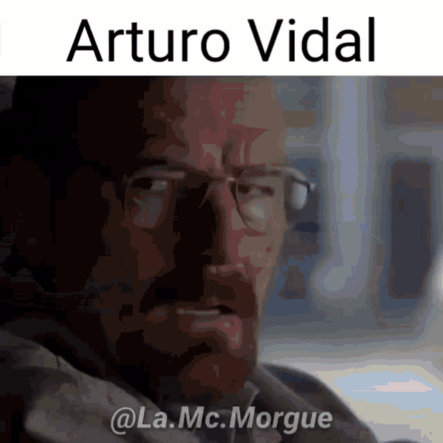 a man with glasses and the name arturo vidal on the top