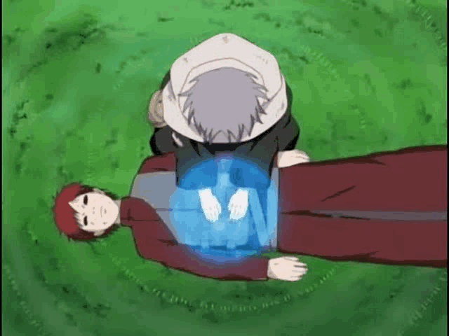 a couple of anime characters laying on top of each other on a lush green field .