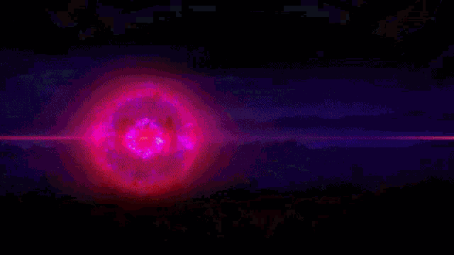a white circle with a red center is surrounded by a red and purple circle .