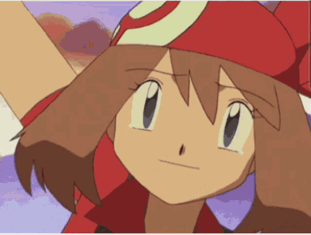 a close up of a cartoon character with a glove on her head