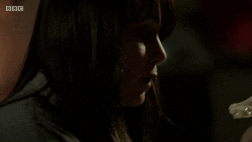 a close up of a woman 's face with bbc on the bottom right
