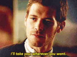 a man in a suit and bow tie is saying i 'll take you wherever you want
